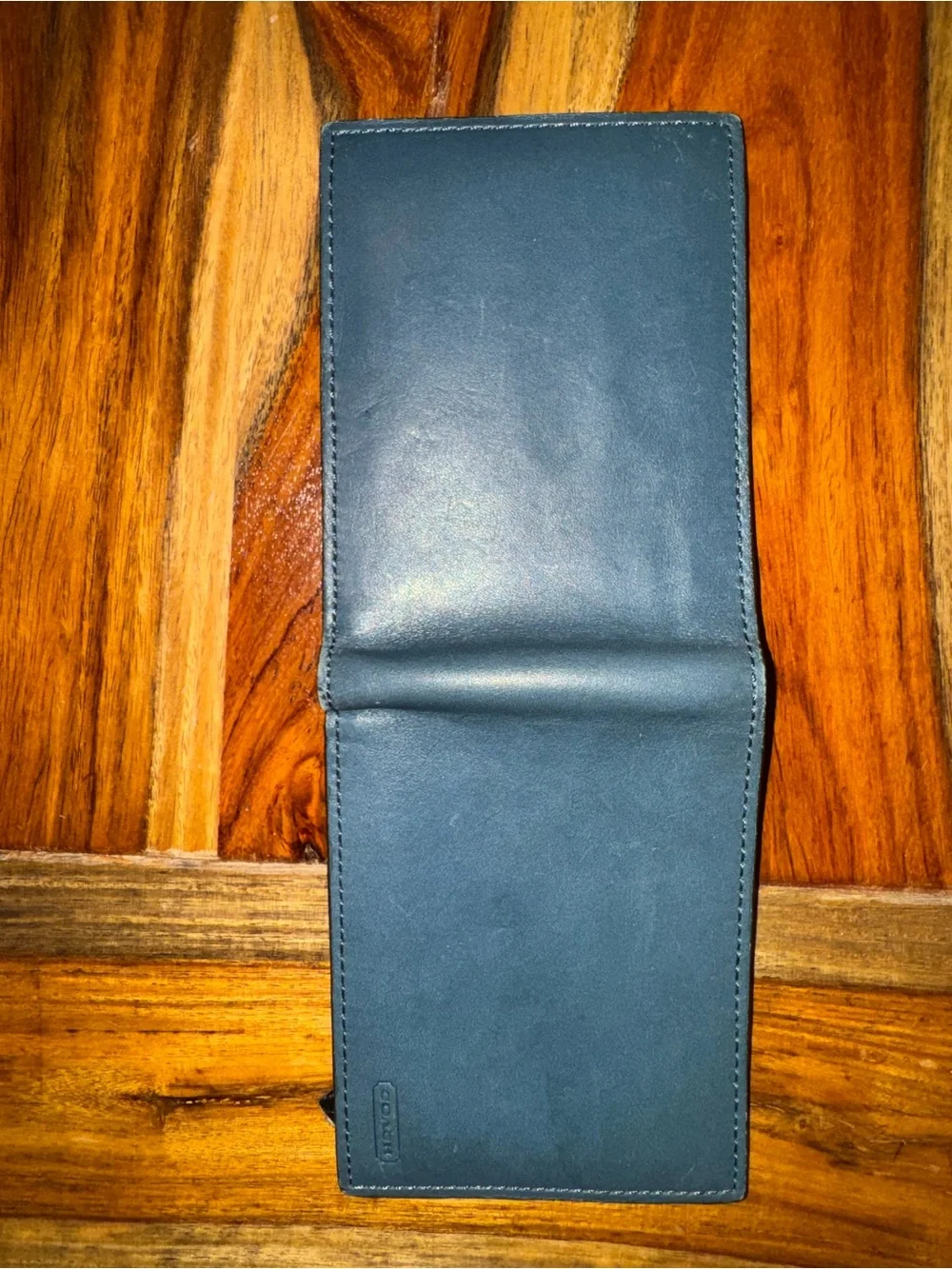 Beautiful blue and brown Coach men’s style leather wallet